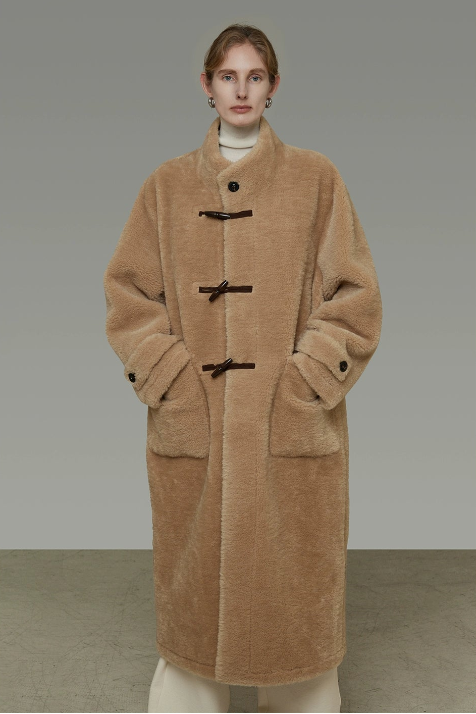 Stand collar horn button leather long fur coat B4442