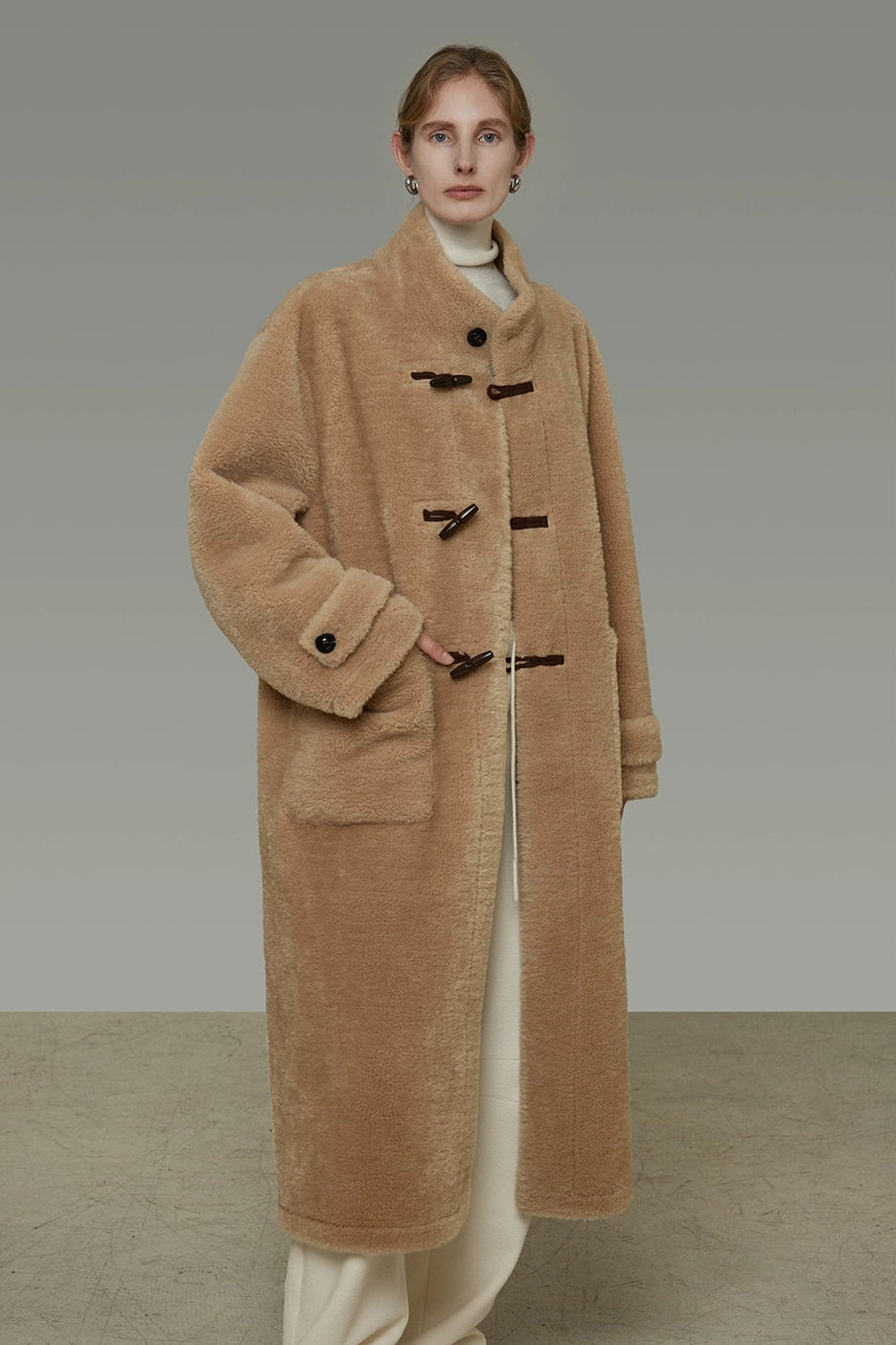 Stand collar horn button leather long fur coat B4442