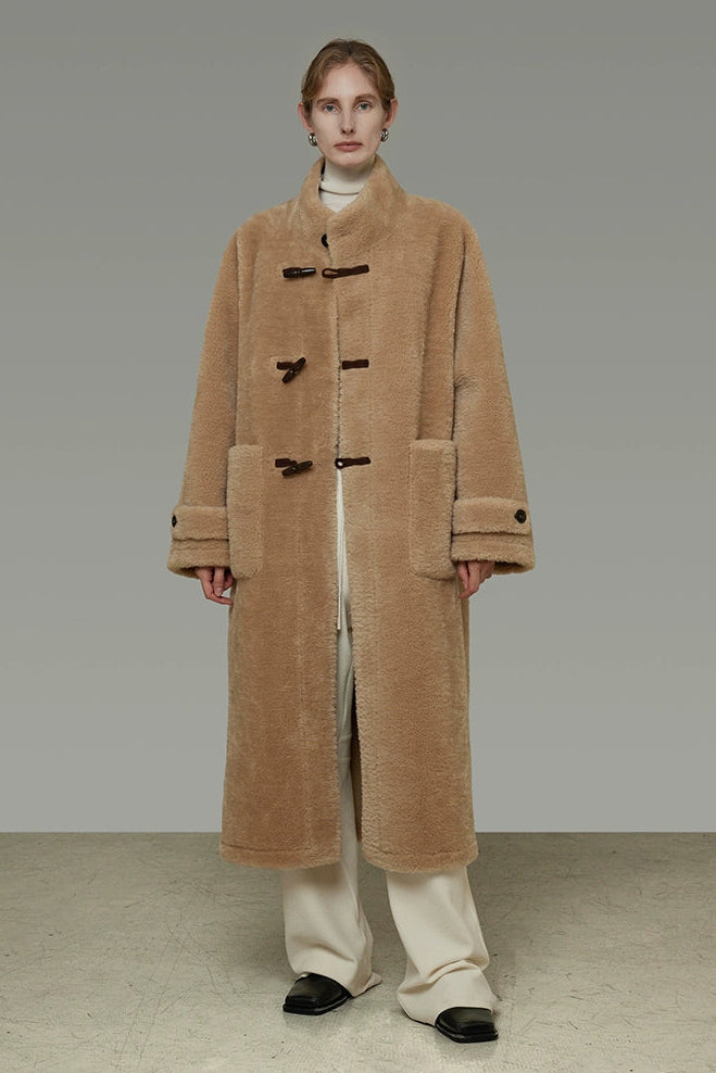 Stand collar horn button leather long fur coat B4442