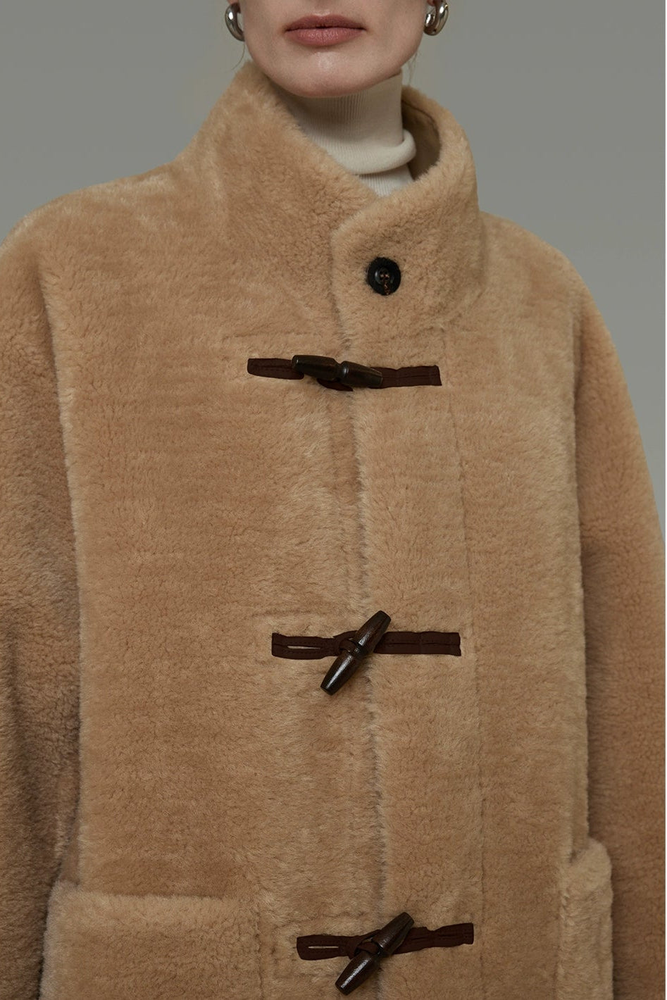 Stand collar horn button leather long fur coat B4442
