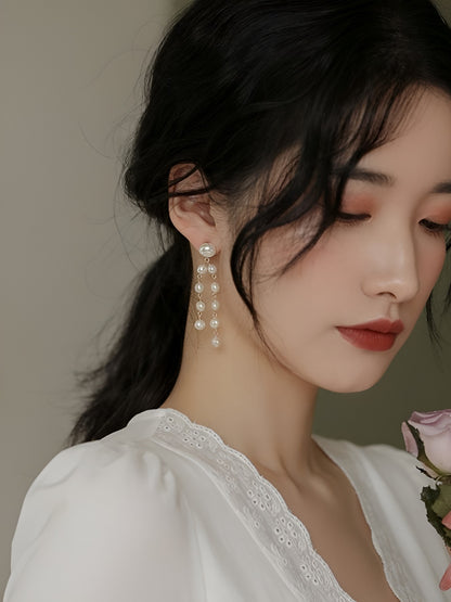 Baroque pearl tassel earrings B1281